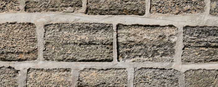 If nouns are bricks, are verbs mortar? (Image from M. Haupt/unsplash.com.)